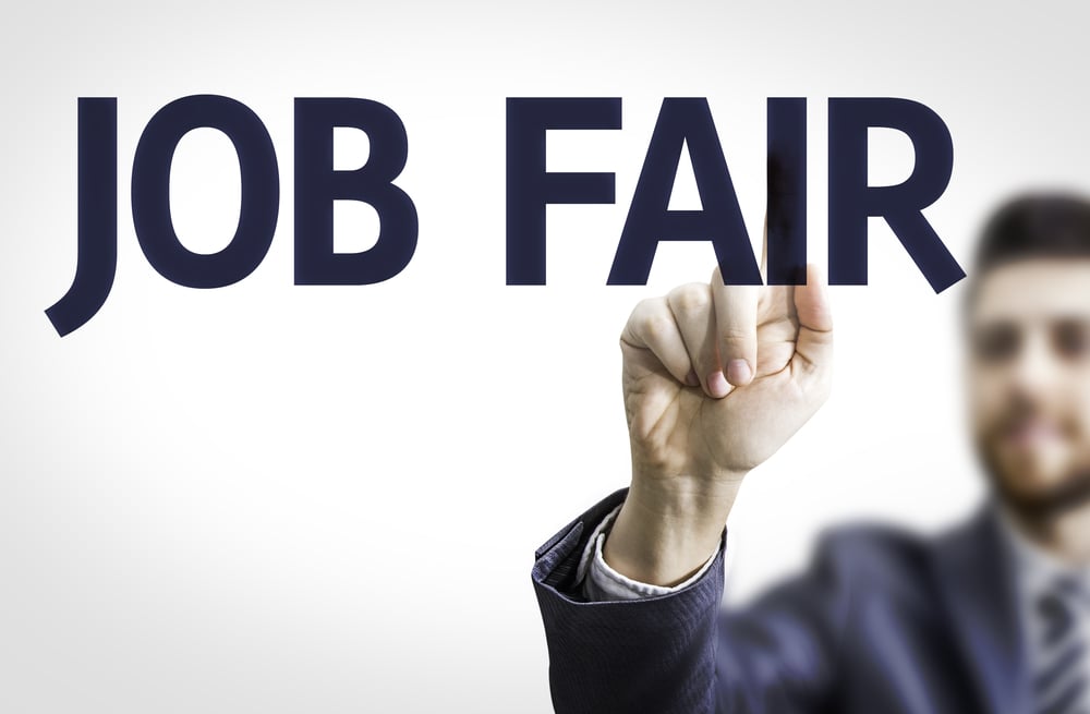 Business man pointing to transparent board with text Job Fair