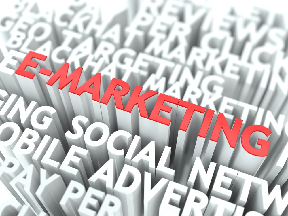 E-Marketing Concept. The Word of Red Color Located over Text of White Color.