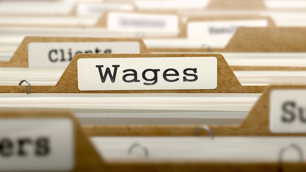 Wages Concept. Word on Folder Register of Card Index. Selective Focus.-1