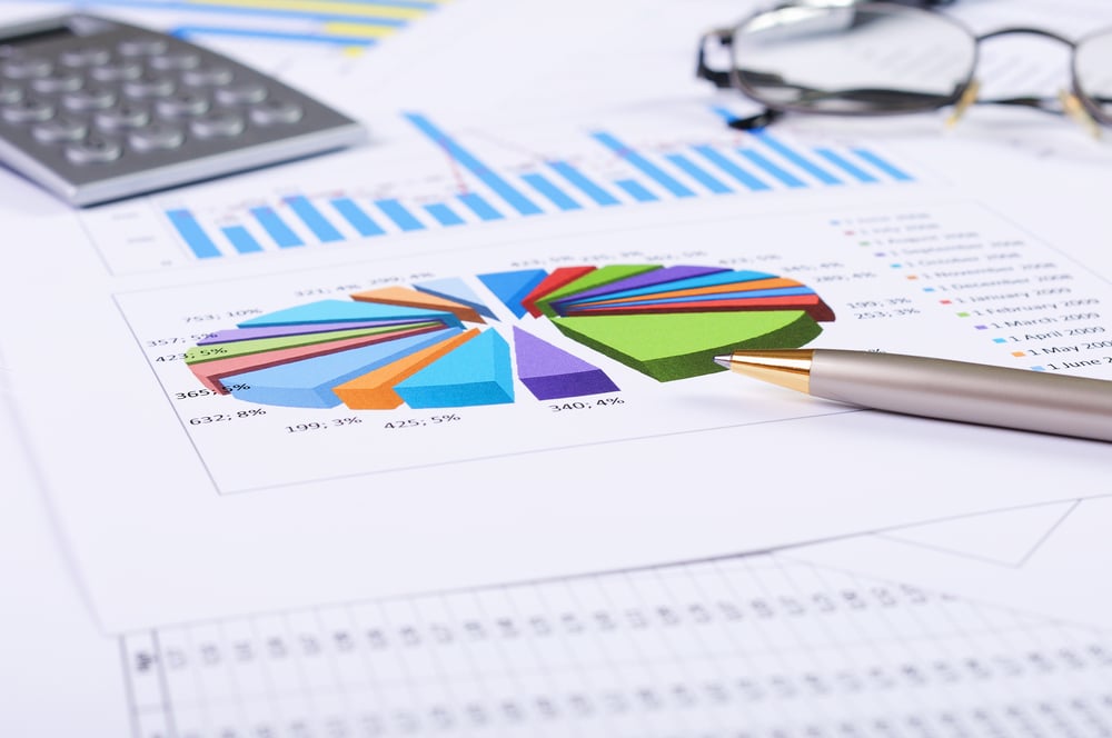 charts and graphs of sales of securities - workplace successful business man-1